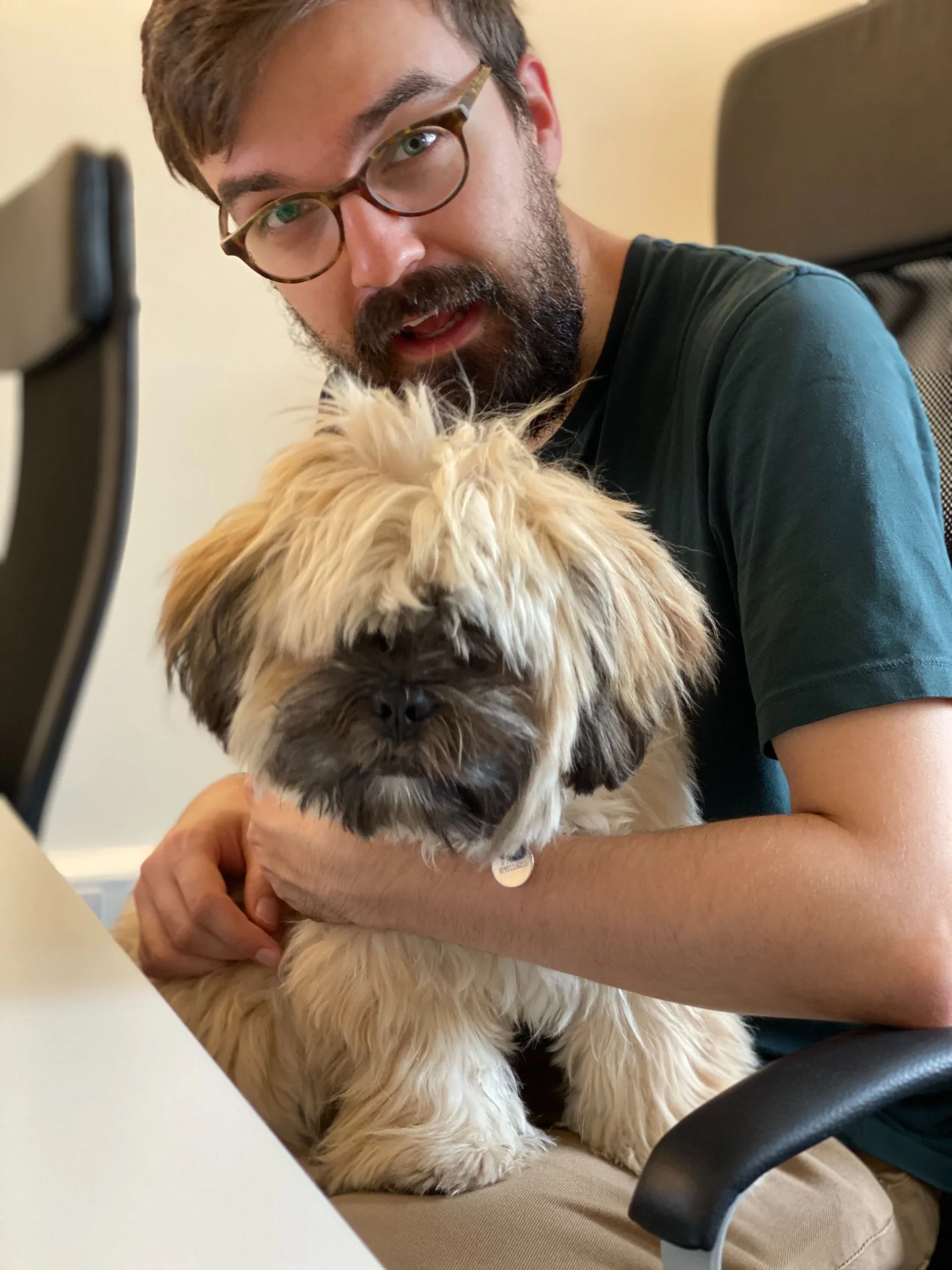 Marcin with our office pup, Elvis