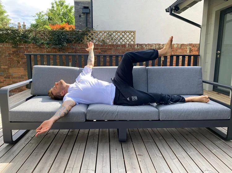 Joel Dummett modeling some Oaktree Garden furniture!